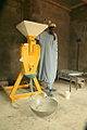 Dc grain mill with mill operator.JPG